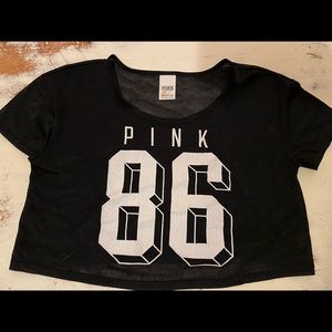 VS Pink black mesh crop with white logo.